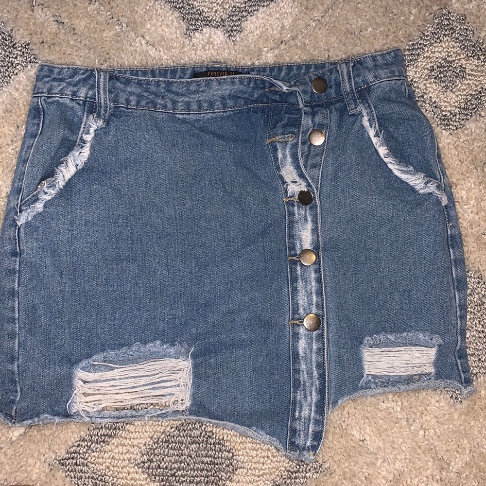 Denim skirt with cute asymmetrical button up design